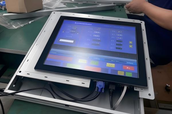 What devices use a touch screen panel in industrial automation